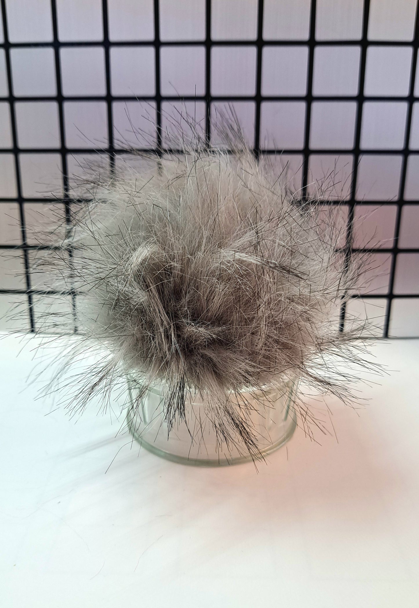 Pompom avec bouton pression