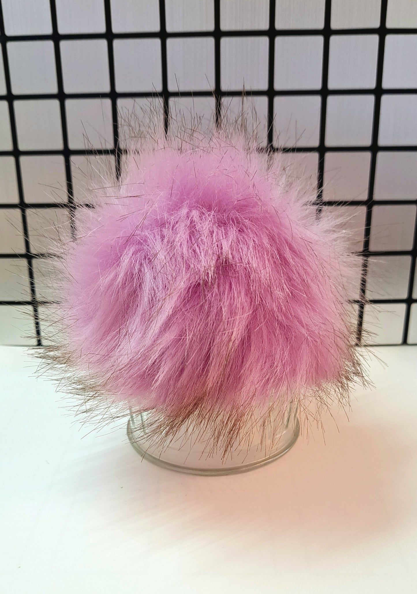 Pompom avec bouton pression